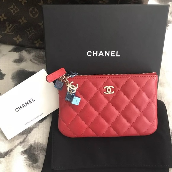 CHANEL Handbags - Chanel O Red Case Zipper Pouch With Charms!